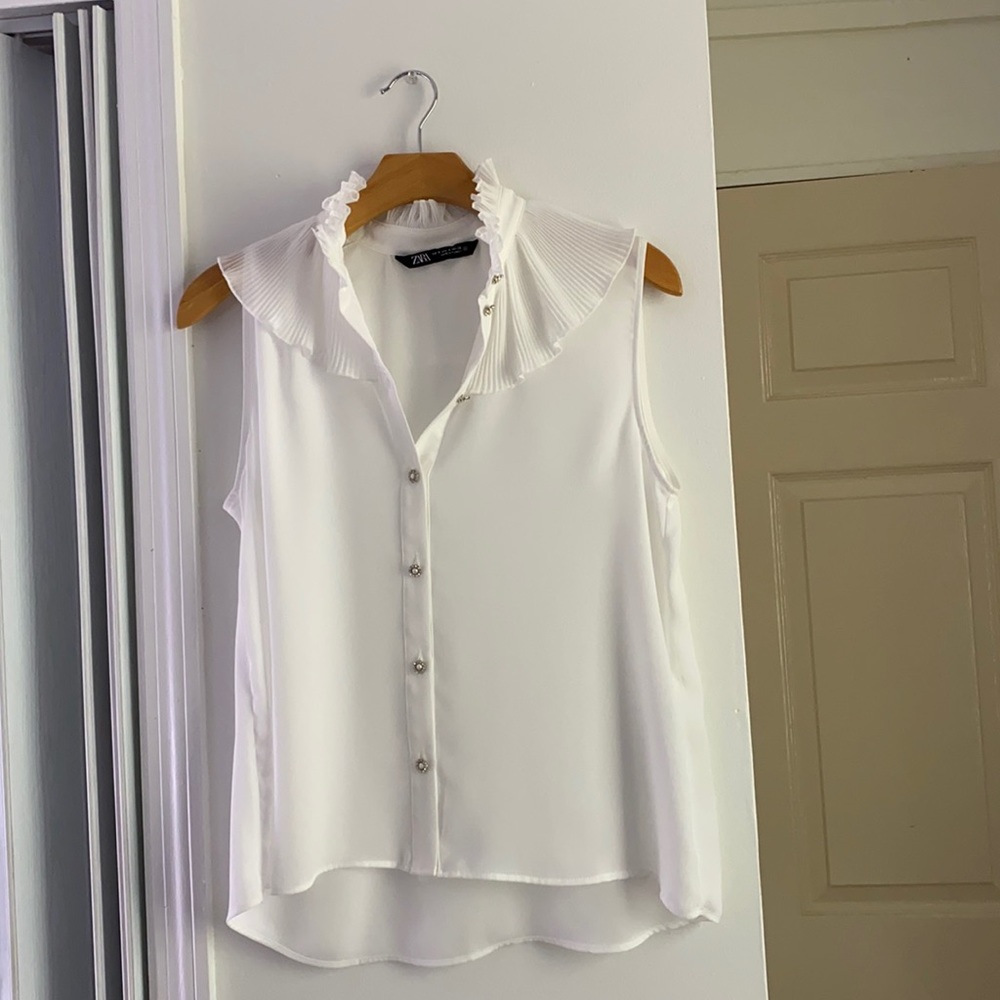 White shirt with crystals bottom
